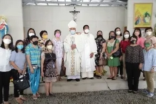 members with archbishop Valles and Fr. Menez